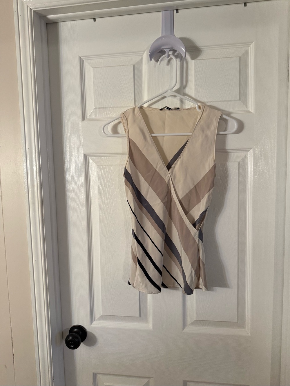 Sleeveless Striped Wrap-Front Blouse in Beige